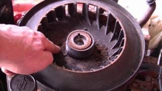 How To Remove The Flywheel On a Lawn Tractor with Briggs amp Stratton Engine [upl. by Kciregor]