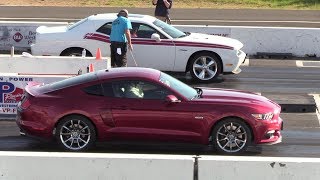 Challenger RT vs Mustang GT  drag race [upl. by Kathe53]