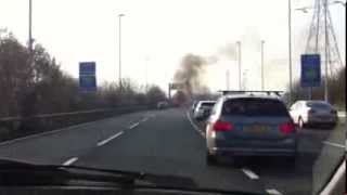 Burning BMW on A406 [upl. by Elauqsap]