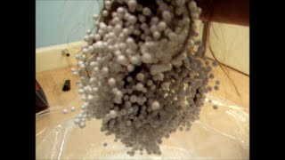 Static electricity polystyrene balls hair hand [upl. by Mundy702]