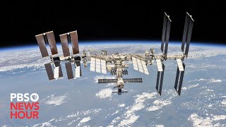 WATCH LIVE ISS astronauts take space walk to install solar array [upl. by Rydder376]