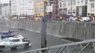 Torrential Rain Creates Waterfall in Victoria Marina St Peter Port Guernsey [upl. by Atteras231]