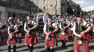 Street Parade of the massed Scottish pipe bands to the 2016 Pitlochry Highland Games in Perthshire [upl. by Akiaki]