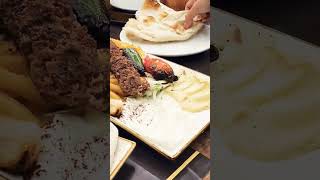 SUMAQ Iraqi charcoal grill platter with humus n garlic sauce rice and fries [upl. by Acirt]