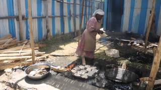 Women hand baking matzah in Gondar Ethiopia [upl. by Gemma]