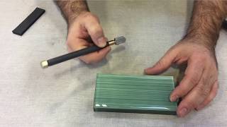 Cutting glass tile using the score and snap method [upl. by Draude]