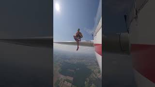 Adventurous Skydiver Sits on Plane’s Wing Before Jumping Off [upl. by Neelsaj615]