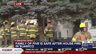 Family of 5 escapes Suamico house fire [upl. by Haerdna950]