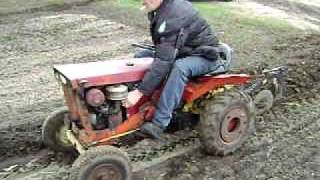 Allis Chalmers B10 Simplicity Landlord tractor plowing garden April 2011 [upl. by Rakso]