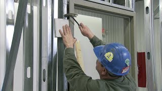 How to Install a Steel Door Frame in Steel Stud Construction  Steel Door Institute [upl. by Merilee651]