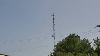 A guyed tower with a lot of microwave antennas [upl. by Brit]