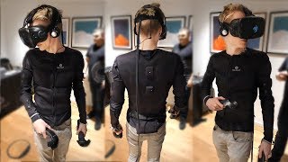 This Haptic Suit Lets You Touch and Feel Virtual Reality  Teslasuit [upl. by Siuqaj]