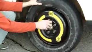 How to change a tire on a Audi A4 [upl. by Acinomed503]