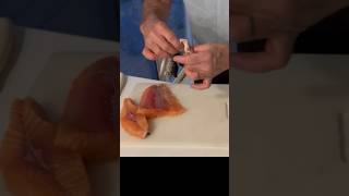 Skinning a salmon fillet  cutting the salmon steak is also posted salmonfillet food salmon [upl. by Kajdan409]