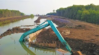 Kobelco SK210LC Long Reach Excavator Stuck In Deep Mud Heavy Recovery [upl. by Etnecniv886]