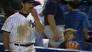 Don Mattingly helps himself to a young fans popcorn [upl. by Llednol]