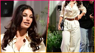 Leonardo DiCaprios ex Camila Morrone looks chic in a satin blouse while filming alongside Tom [upl. by Napra]