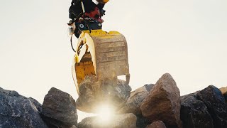 Autonomous excavator constructs a sixmetrehigh dry stone wall [upl. by Valenta]