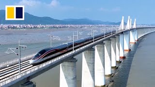 China launches first crosssea bullet train line [upl. by Inobe198]