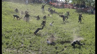 Thrills and spills as Cheese Rolling 2023 leads to MULTIPLE injuries in Gloucestershire UK [upl. by Kalina]