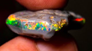 Grinding into this uncut rough opal the gems emerged [upl. by Nollid]