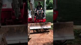 Doing dirt work with a mini excavator [upl. by Anrym]