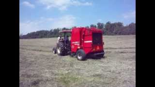 Baling Hay with a Hesston 1745 Baler [upl. by Marinelli]