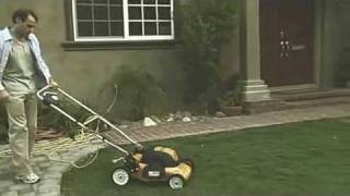 Electric Lawnmower Guy gets pulled by lawnmower [upl. by Acnaib]