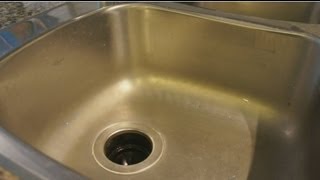 Leaking Kitchen Sink  How to fix clean and seal easy guide [upl. by Itsuj]