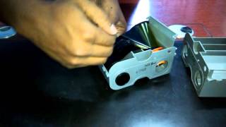 How to change ribbon on Fargo DTC1250e ID DirectToCard Printer amp Encoder [upl. by Irakab]