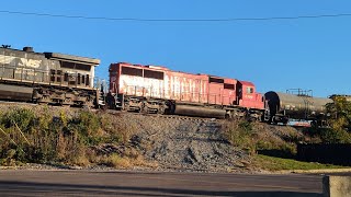 Westbound NS mixed manifest with Canadian Pacific behind leader and EOT DPU BNSF [upl. by Jourdan]