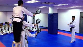 Hankuk Taekwondo Singapore  540 Degree Triple Kick [upl. by Ydualc908]