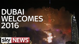 Dubais New Years Fireworks Display Goes On Next To Burning Building [upl. by Atilek]