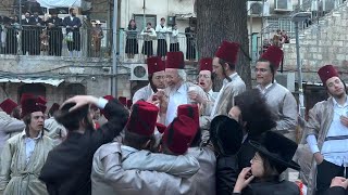 UltraOrthodox Jews celebrate Purim holiday in Jerusalem  AFP [upl. by Ettinger]