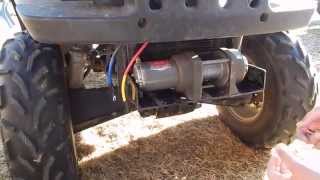 HOW TO INSTALL A WARN WINCH ON AN ATV [upl. by Ellasal939]