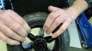 Fitting a Mountain Buggy Duet tyre [upl. by Vanda]