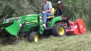 Flail mowing small patch of tall grass with subcompact tractor [upl. by Theone]