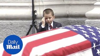 Heartbreaking moment boy salutes fallen airman dads coffin  Daily Mail [upl. by Imrots]