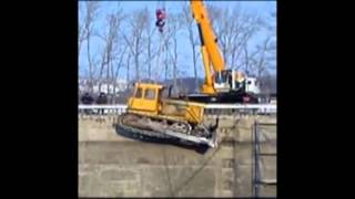 Crane Lowering Dozer Into Pit  Fairly Smooth Technique [upl. by Noslrac]