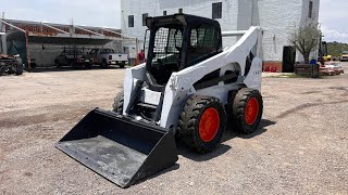 Minicargador Bobcat S850 2014 [upl. by Zela]