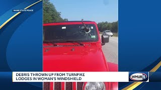 Debris thrown up from turnpike lodges in New Hampshire womans windshield [upl. by Elleinad]