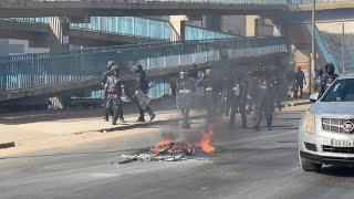 Protesters build barricades in Dakar as clashes follow Senegal election postponement  AFP [upl. by Daughtry753]