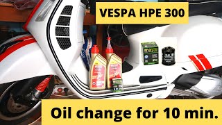 Vespa GTS 300 HPE oil change for 10 minute [upl. by Crooks224]