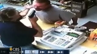 Watch Liquor store cashier pulls gun on wouldbe robber [upl. by Wiley]