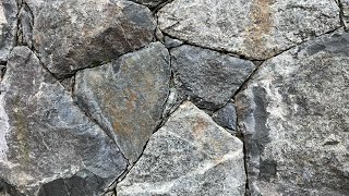 Secrets to creating a beautiful NATURAL STONE WALL Insights from a real stonemason [upl. by Rolo]