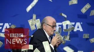 Moment Sepp Blatter was showered with fake dollar bills  BBC News [upl. by Singband115]