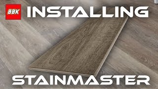 Installing STAINMASTER Washed Oak Locking Luxury Floor and Review  Bathroom Floor [upl. by Klepac704]