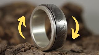 This Wedding Ring Is INSANE Silver amp Damascus Steel Spinner Ring [upl. by Atteselrahc]