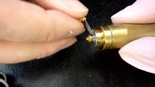 How to fit a watch mainspring into the barrel using Bergeon winders Watch repairing techniques [upl. by Airoled902]