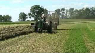 Baling hay with a John Deere 630 tractor and 336 baler [upl. by Sirk]